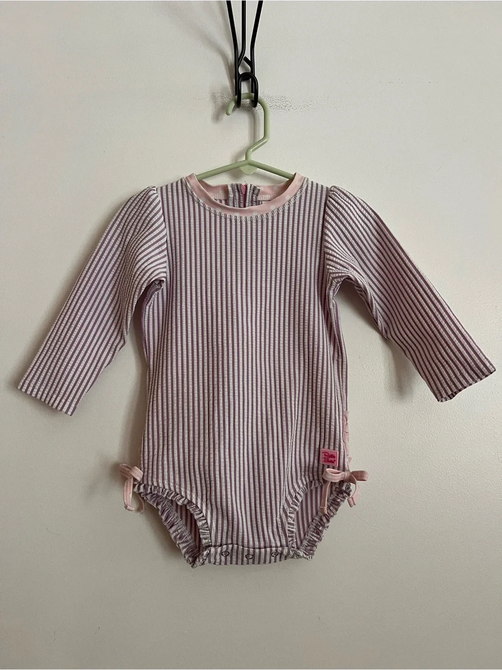 Ruffle Butts purple striped swimsuit